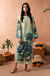 Woman wearing a floral dress with a beige background