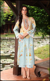 Azura Kurta Set in pastel blue Swiss cotton with mustard accents.