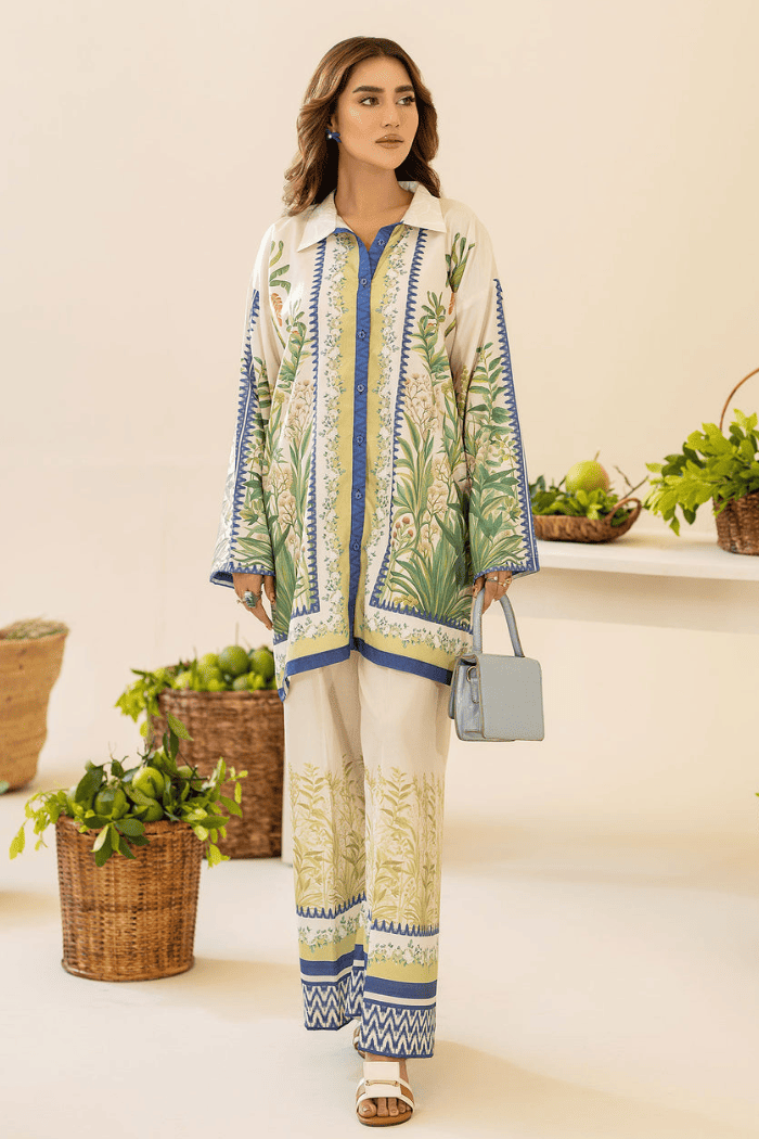 Woman wearing a patterned outfit with plants in the background