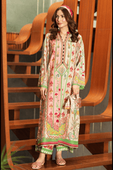 Woman in a floral dress standing on a wooden staircase