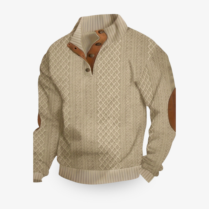Jersey beige de punto trenzado con parches de cuero en los codos