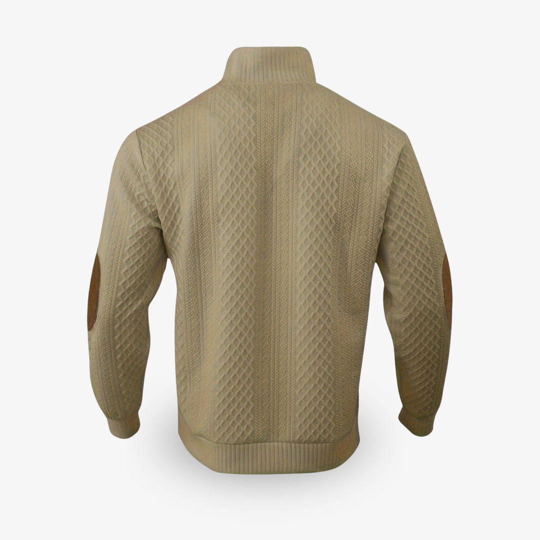 Jersey beige de punto trenzado con parches de cuero en los codos