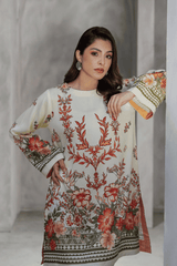 Woman wearing a floral dress against a neutral background