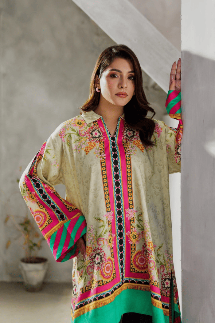 Woman wearing a colorful dress in an indoor setting
