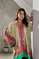 Woman wearing a colorful dress in an indoor setting