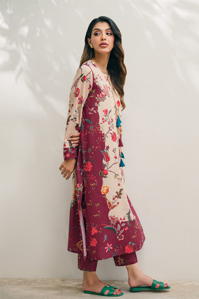 Woman wearing a floral dress with a white background