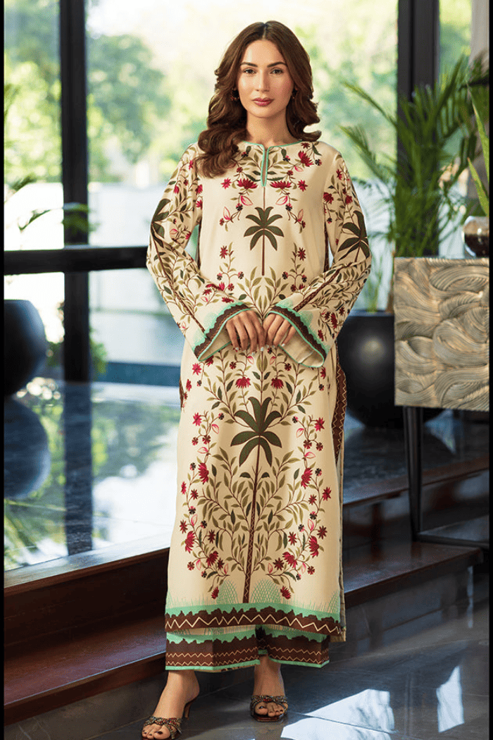 Woman wearing a traditional  outfit in a modern indoor setting