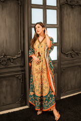 Woman in a traditional outfit standing in front of ornate wooden panels.