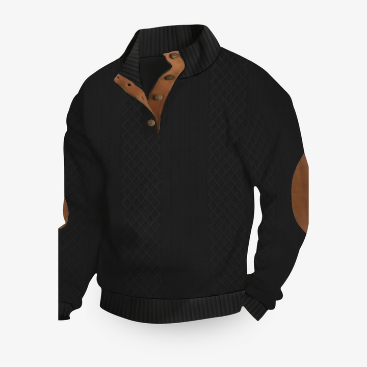 Jersey beige de punto trenzado con parches de cuero en los codos