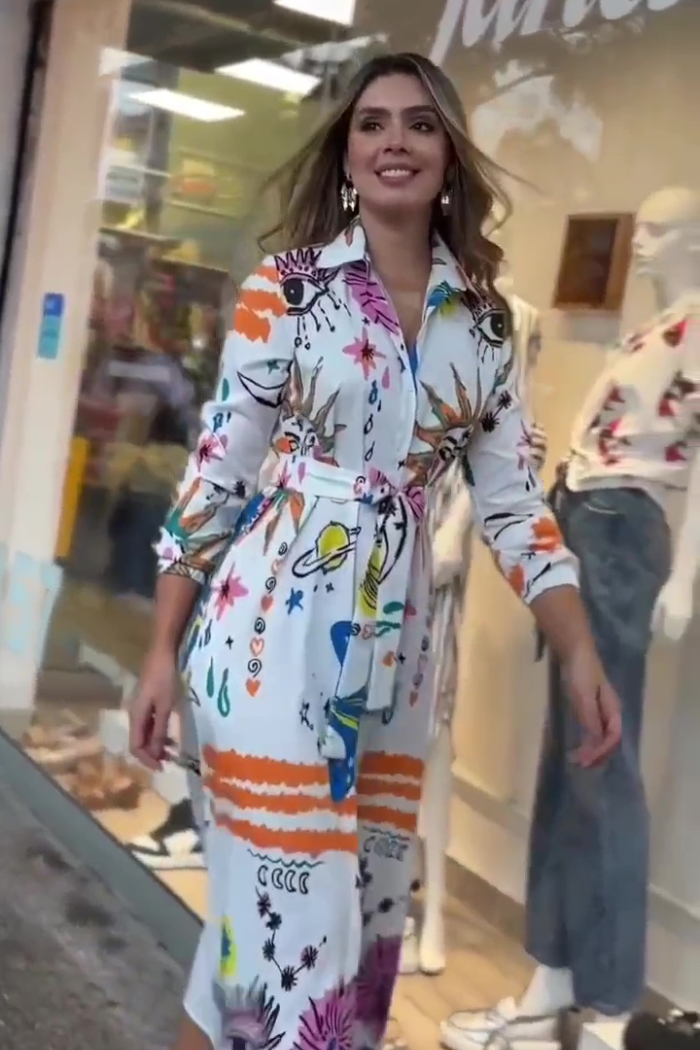 Woman wearing a colorful outfit in a store setting