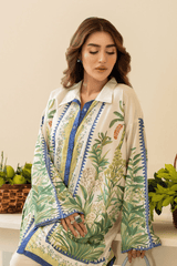 Woman wearing a floral patterned shirt with a beige background