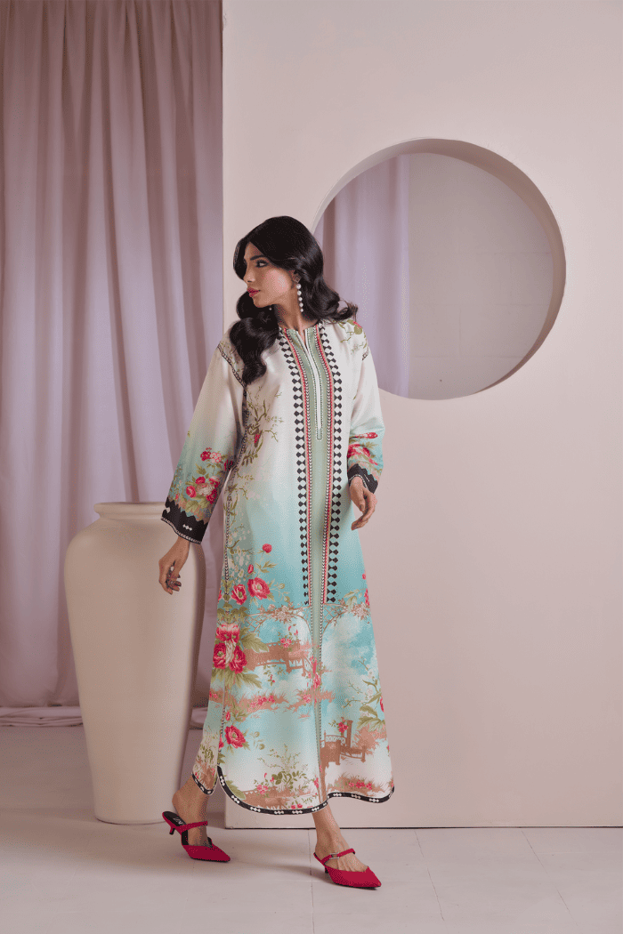 Woman wearing a floral dress with a light background