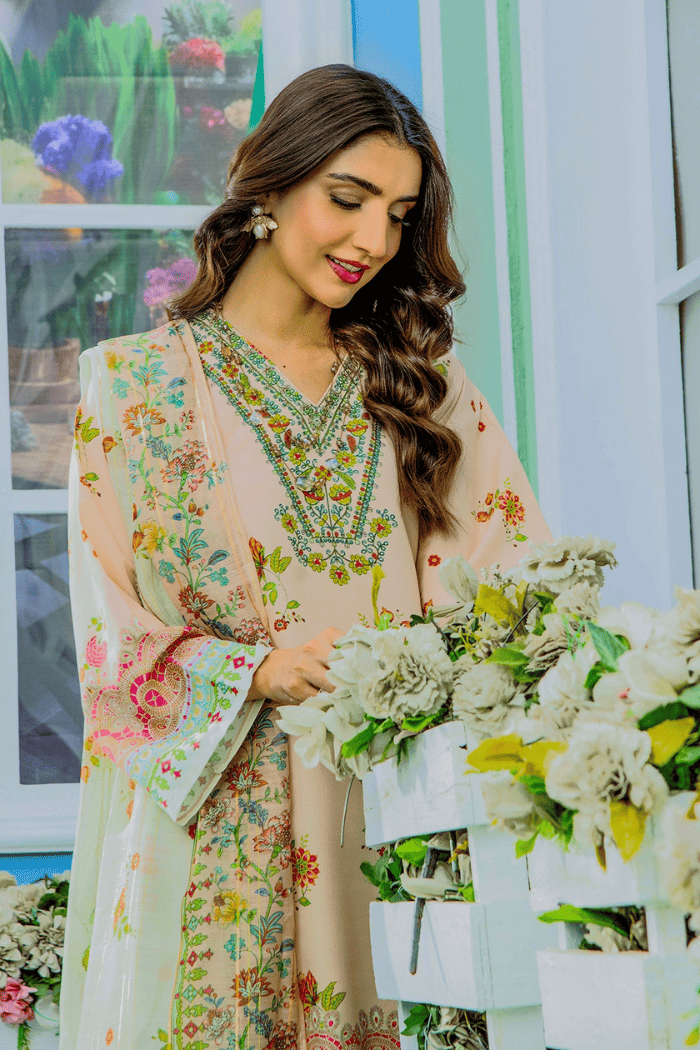 Woman holding flowers in a decorated room with colorful decor