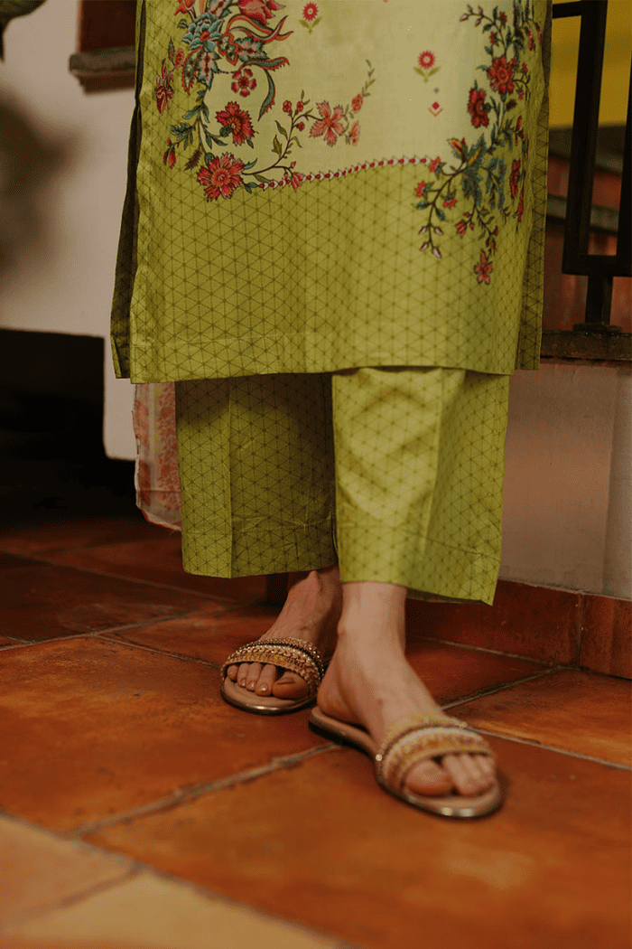  Close-up of floral print on lime green Mehrose Kurta Set.