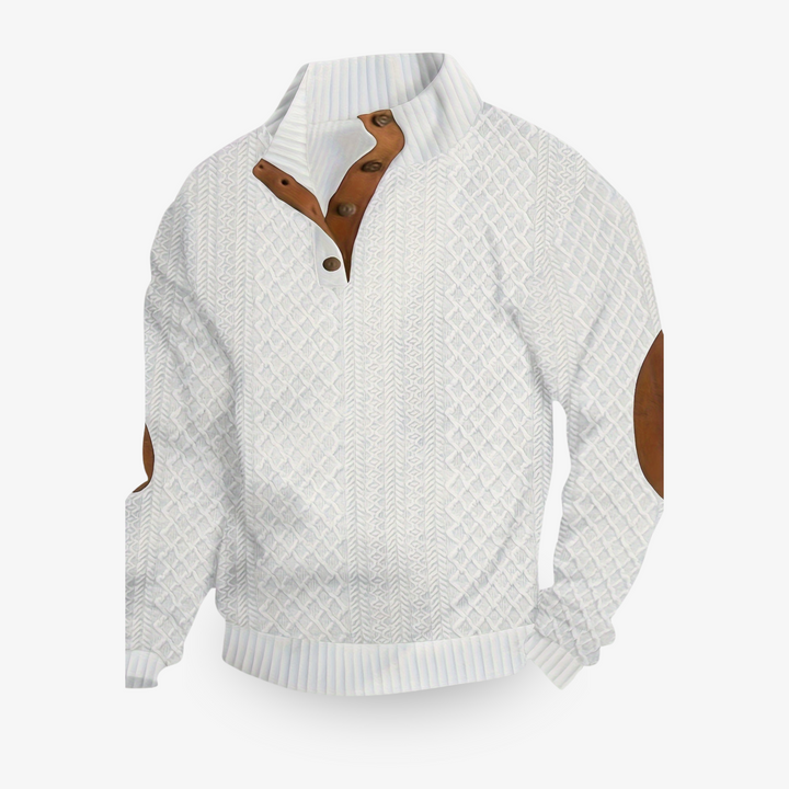 Jersey beige de punto trenzado con parches de cuero en los codos