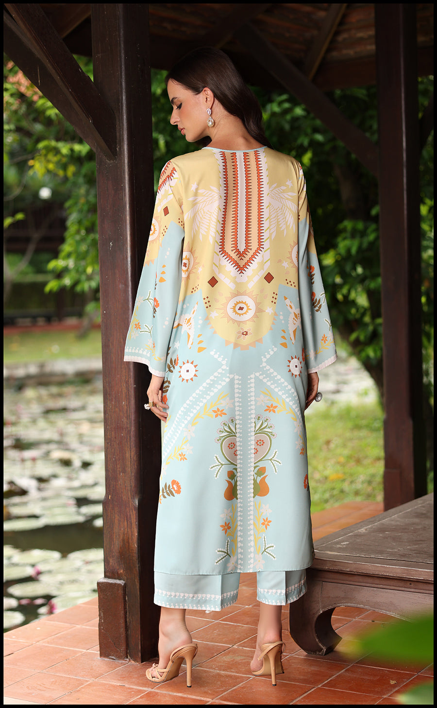 Back view of Azura Kurta Set in pastel blue with subtle mustard detailing.