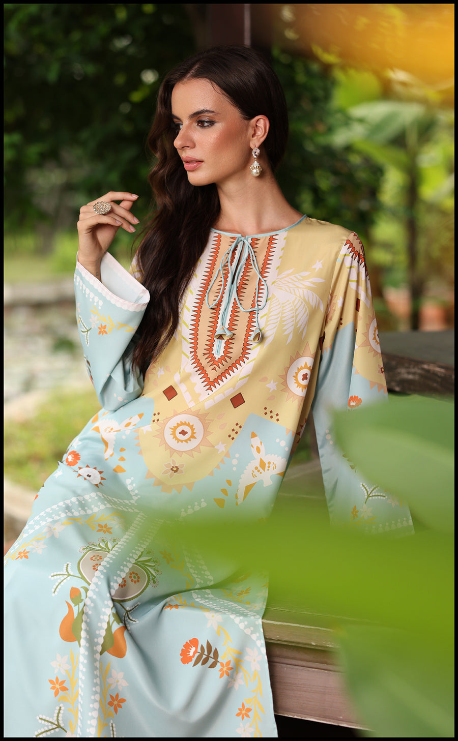 Close-up of pastel blue Azura Kurta Set showcasing fine print and fabric texture.