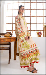 Woman wearing a traditional outfit in a bright room with wooden furniture and decorative items.