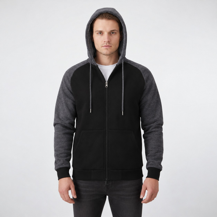 Men's black zip-up hoodie with dark grey raglan sleeves over a white T-shirt