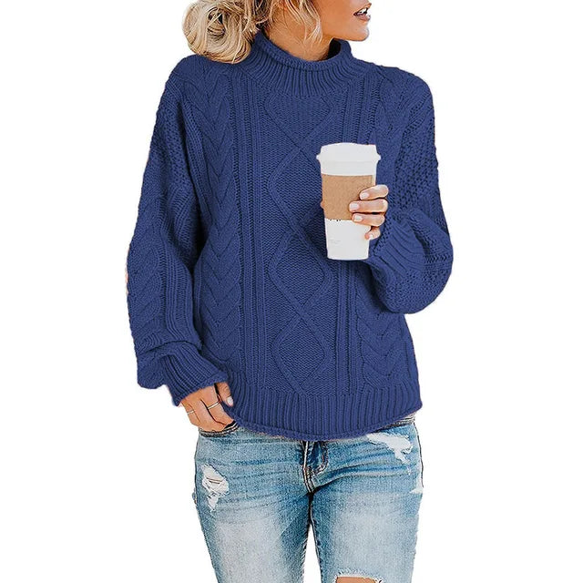 Blue cable knit turtleneck sweater